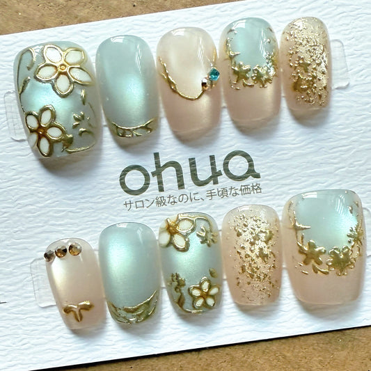 OHUA 低彩度ブルーxヌーディ ゴールドフラワーネイルチップ